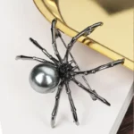 Broche araignée avec perle 9